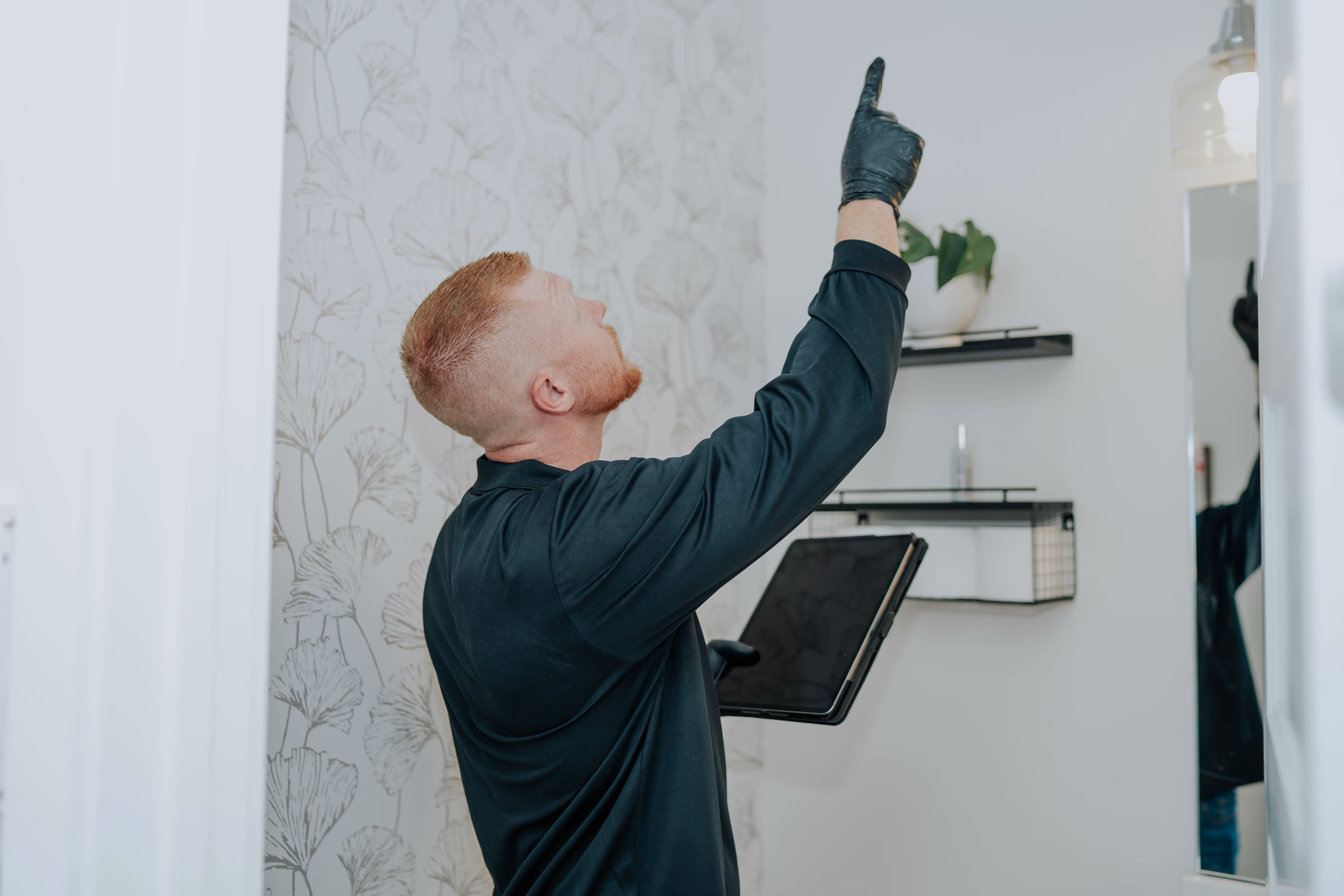 Pure Maintenance of Southern California specialist inspecting a property